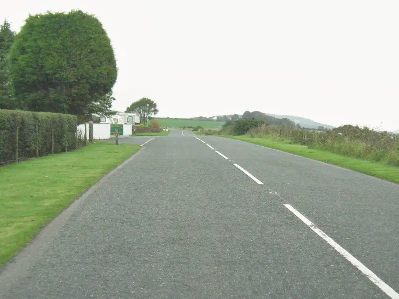 Photo: Ann Cook / CC BY-SA 2.0, via Wikimedia Commons Entrance to Wig Bay Holiday Park