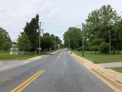 12 30 40 View west along Maryland State Route 314 (East Sunset Avenue) at Mill Street in Greensboro,…