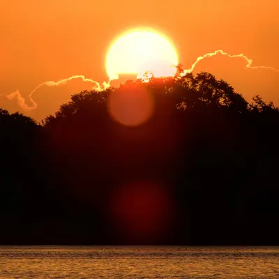 Sun Rise over a Lake, near Jan-Phyl Village
